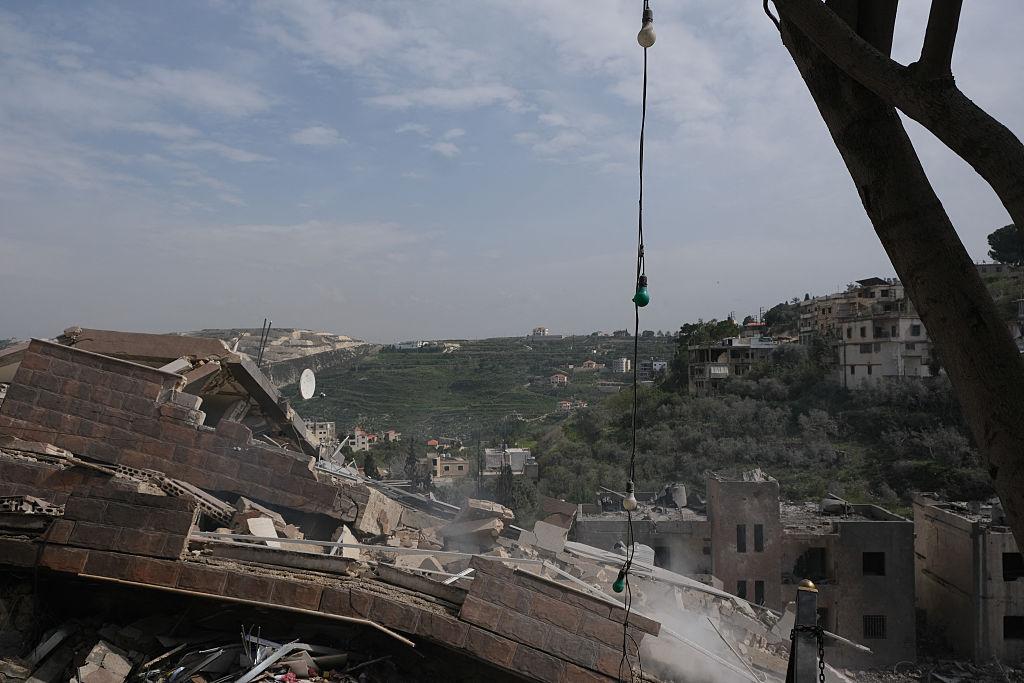 Lebanon humanitarian crisis showing destruction and rubble after air strike in residential area