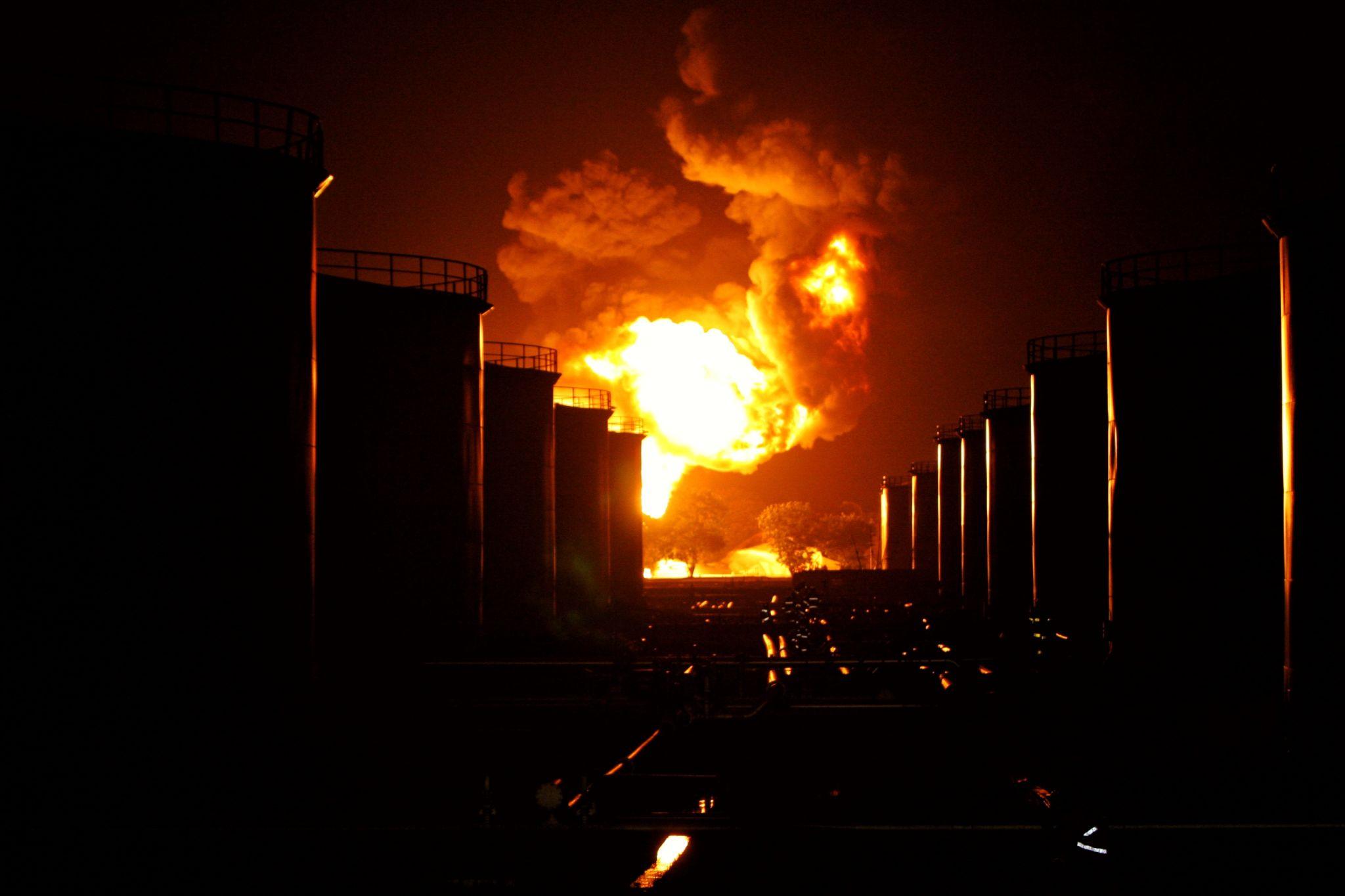 Iran Oil Infrastructure Damage Raises Global Disaster Fears 2026 1 Iran oil infrastructure damage showing refinery fire after reported attacks