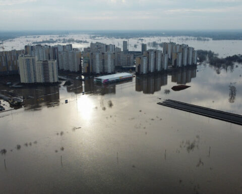 Russia extreme weather alert cars submerged in flooded streets