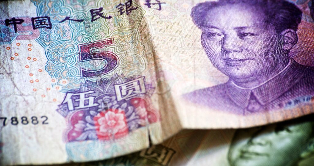 Chinese yuan drops the lowest against rising US dollar