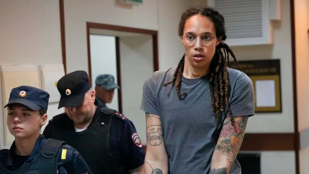 American basketball player Brittney Griner is escorted before a court hearing outside Moscow