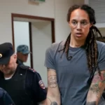 American basketball player Brittney Griner is escorted before a court hearing outside Moscow