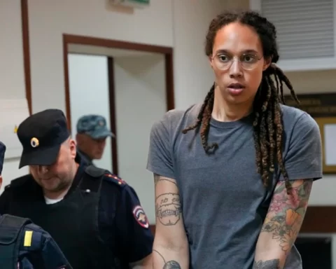 American basketball player Brittney Griner is escorted before a court hearing outside Moscow