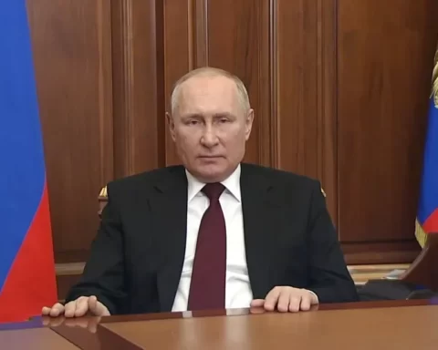 putin is posing for picture