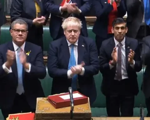 Mr Boris and other Mps clapping