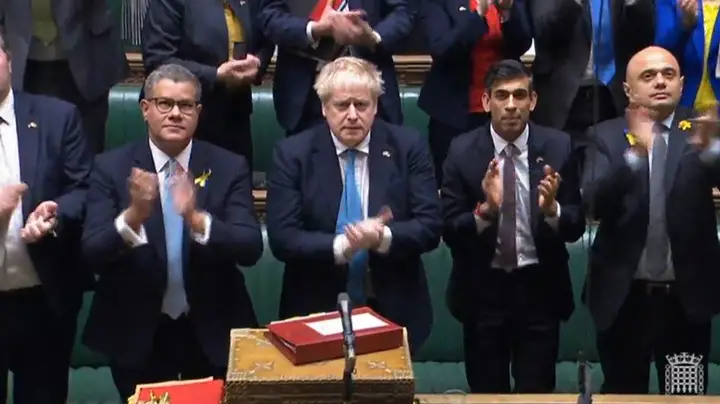 Mr Boris and other Mps clapping