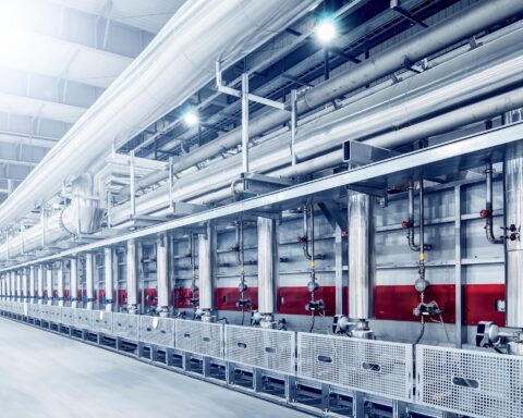 Workers operating production lines during China manufacturing slowdown in May 2026