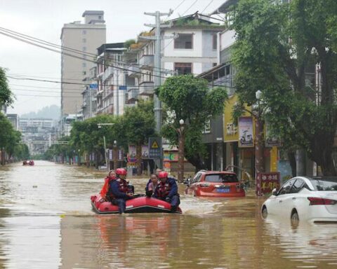 Residents evacuating during China weather disaster flooding