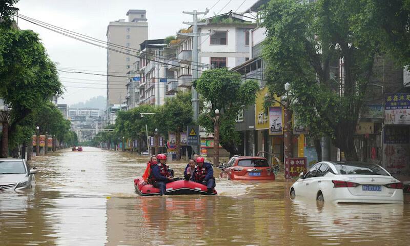 Residents evacuating during China weather disaster flooding