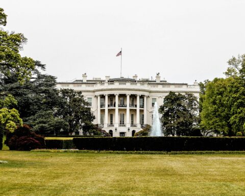 Police cars block intersection following a White House shooting