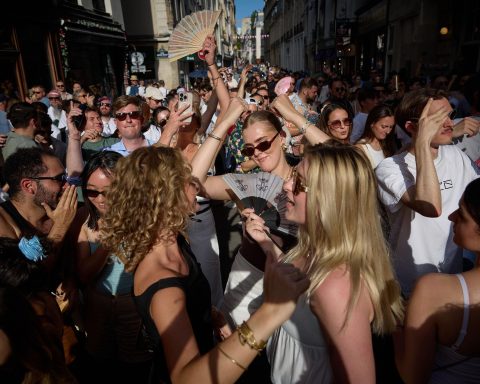 Crowds attend a street music festival during the Europe heat alert in France with emergency safety measures in place
