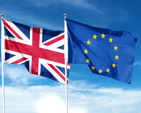 UK Brexit news featuring the United Kingdom and European Union flags representing post-Brexit relations in 2026