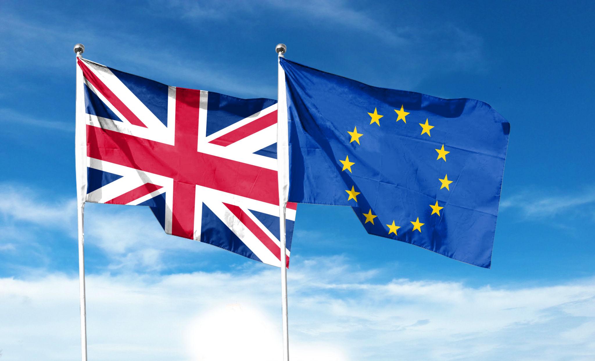 UK Brexit news featuring the United Kingdom and European Union flags representing post-Brexit relations in 2026