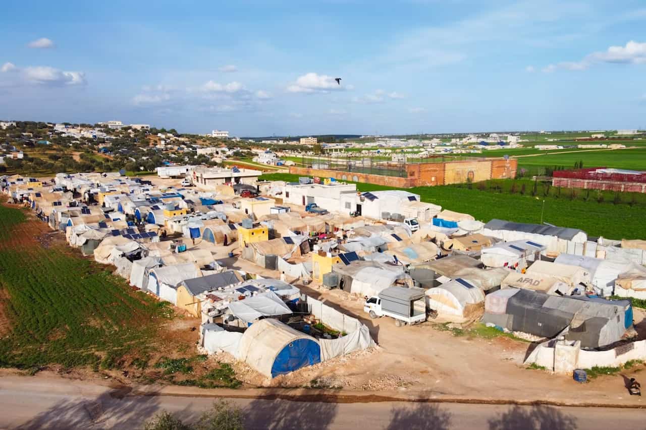 Migrants flee South Africa in camps