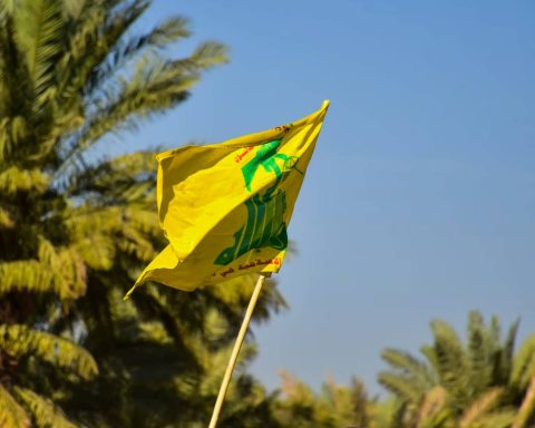 Hezbollah supporters protest the security deal