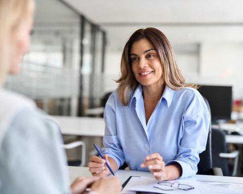 Business adviser discussing UK contractor company registration with a freelancer