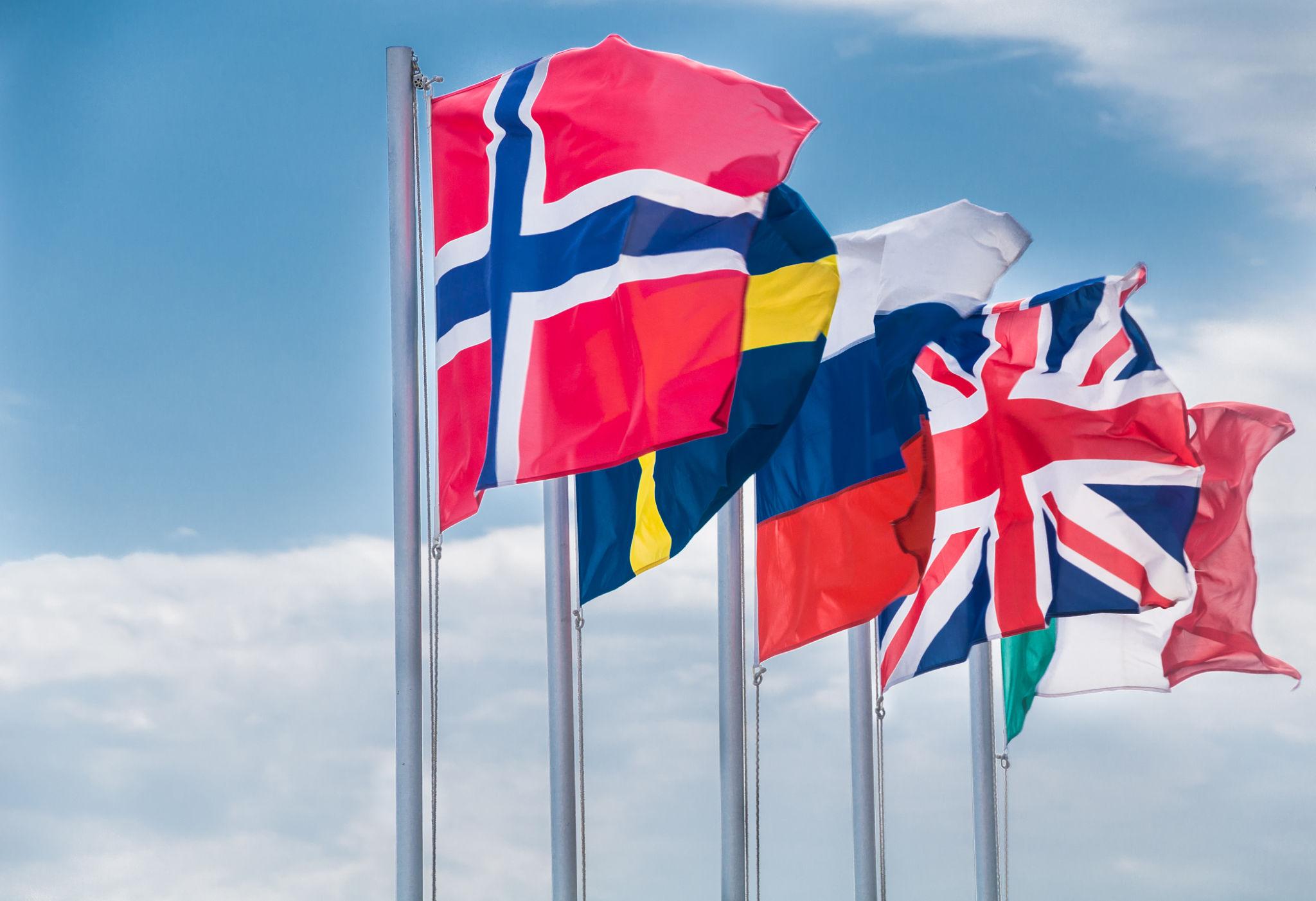 UK Canada France and Norway flags displayed following coordinated sanctions announcement over West Bank violence