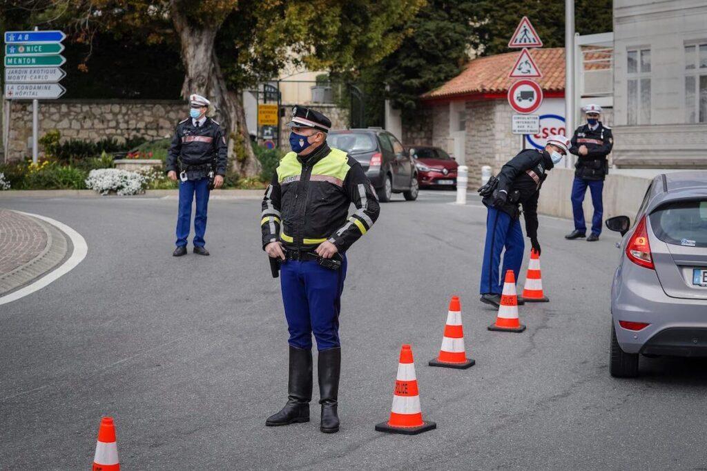 Monaco police vehicles deployed as authorities launch a manhunt after the explosion
