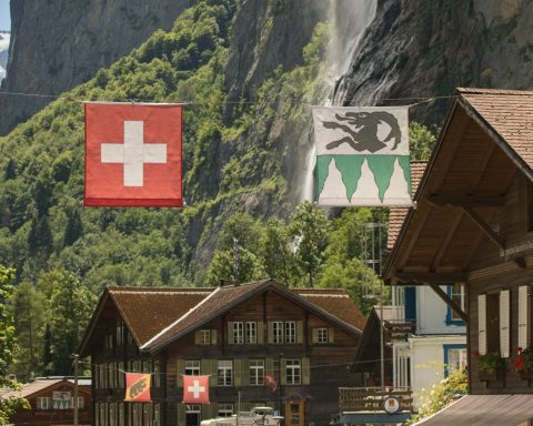 Swiss voters participate in a referendum on population cap