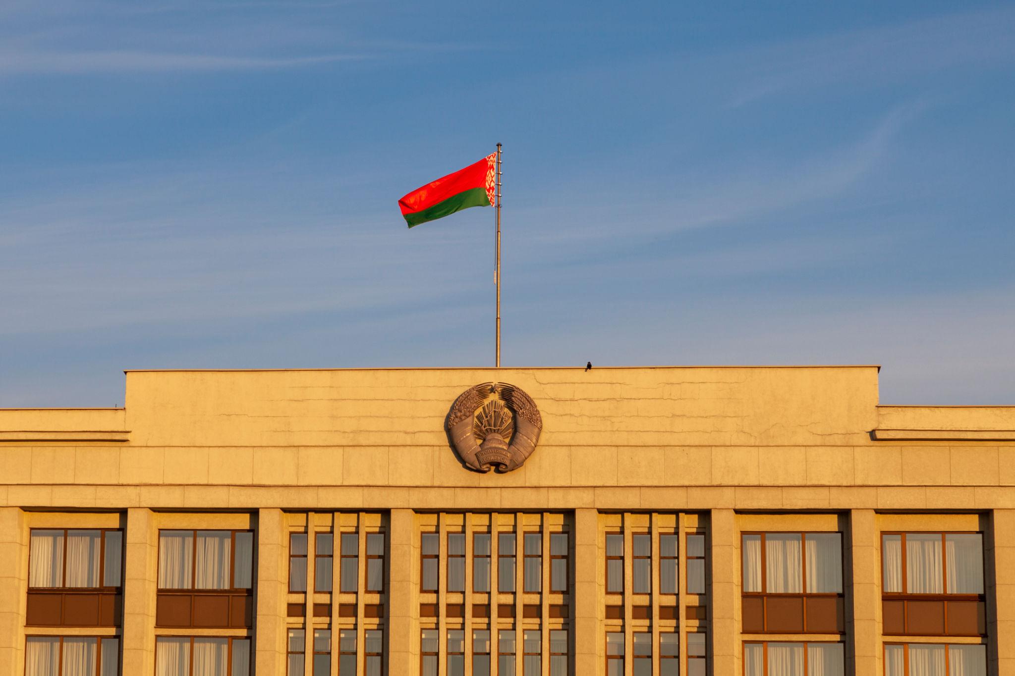 Belarus national flag outside a government building following the Belarus clemency decision