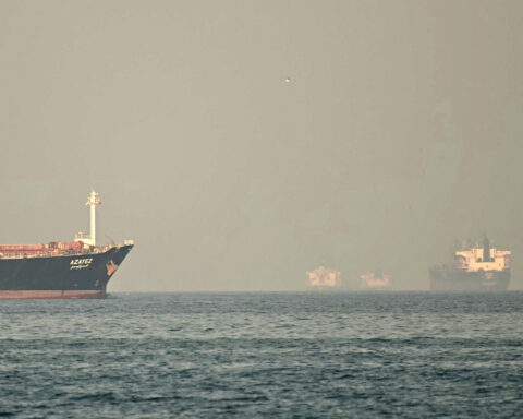 cargo ships passing through Strait of Hormuz international shipping dispute