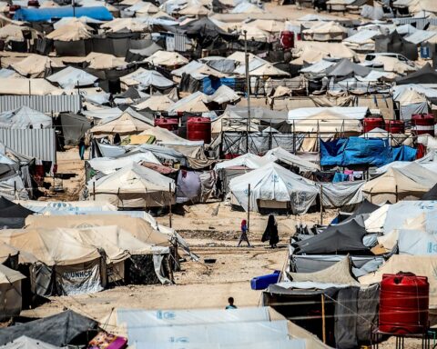 Civilians react after displacement camp incident inside Al Hol