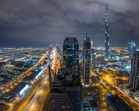 aircraft departing Dubai International Airport amid Dubai war impact economy travel uncertainty