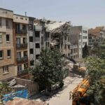 Iran humanitarian crisis deepens with destroyed apartment blocks in Tehran