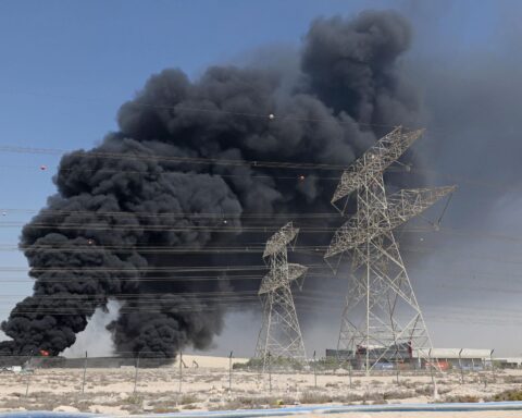 firefighters responding to UAE energy infrastructure attack at Abu Dhabi energy site