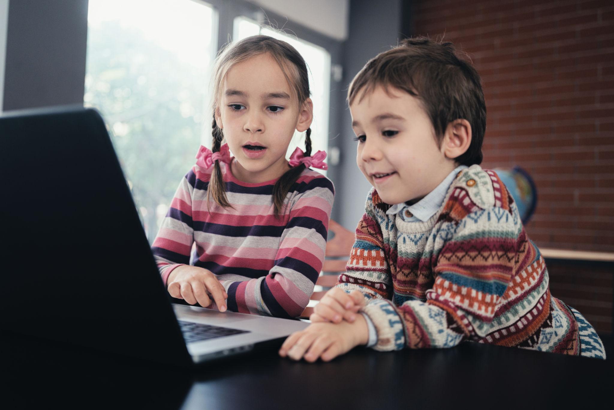 Child Online Safety Law Reshapes Digital Policy Landscape Warsaw 2026 1 Child online safety law addresses risks of children using laptops at home