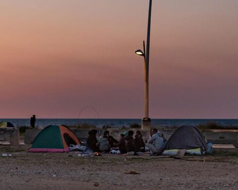 Beirut displacement crisis tents along Beirut waterfront sheltering displaced families
