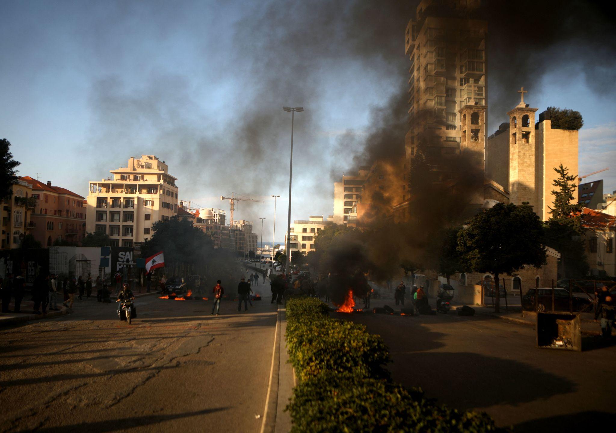 Iran Conflict Impact Lebanon as Hezbollah Halts Protests Amid Rising Tensions 2 Iran conflict impact Lebanon showing Amal Movement supporters during political tension