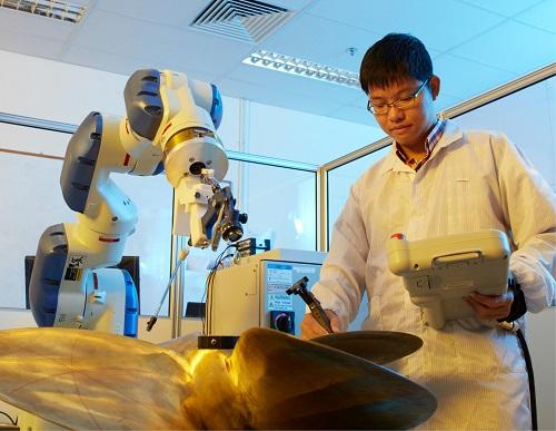 Singapore Emerges as Global AI Hub as Tech Giants Shift Operations Amid US-China Tensions 3 Artificial intelligence engineers working in Singapore AI hub innovation lab