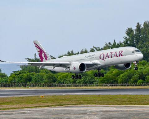 Qatar Airways flight operations Airbus A350 taking off from Doha runway