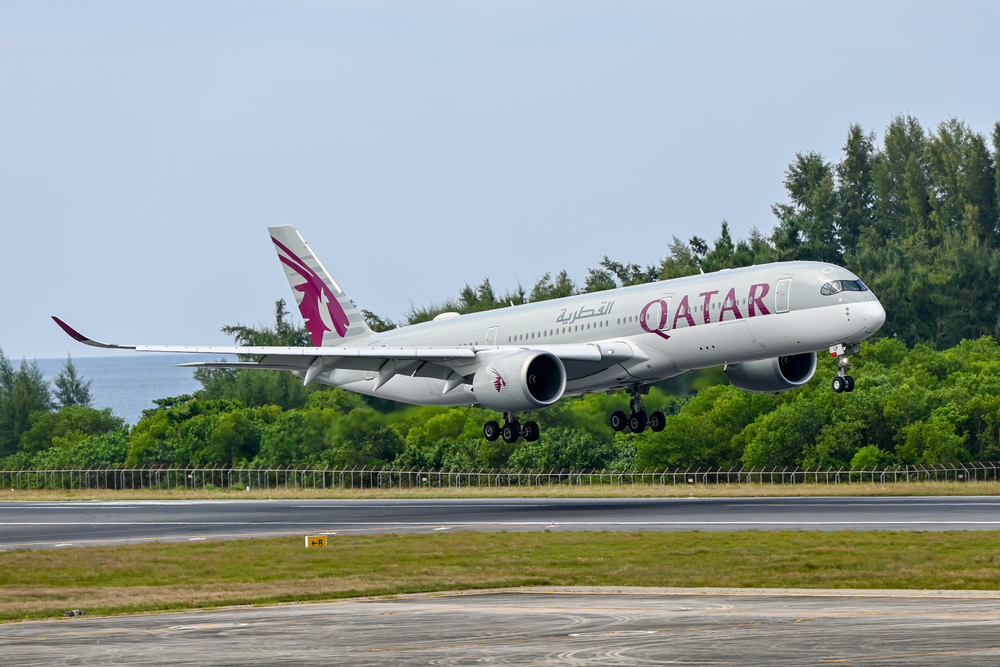 Qatar Airways flight operations Airbus A350 taking off from Doha runway