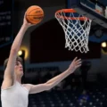 7ft 9in teen Olivier Rioux becomes tallest scorer in college basketball