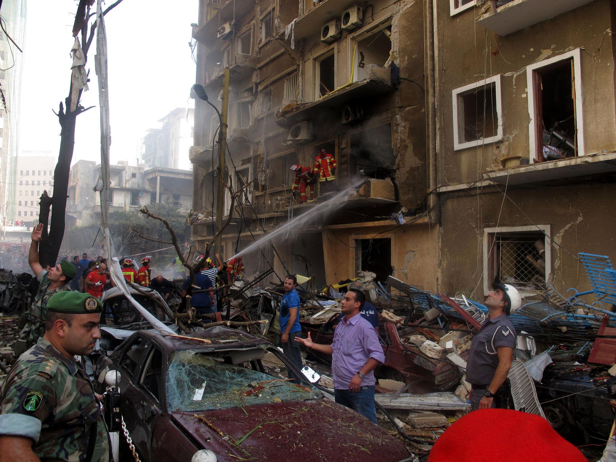 Israel Hezbollah conflict Beirut smoke rising over central Beirut after reported strike