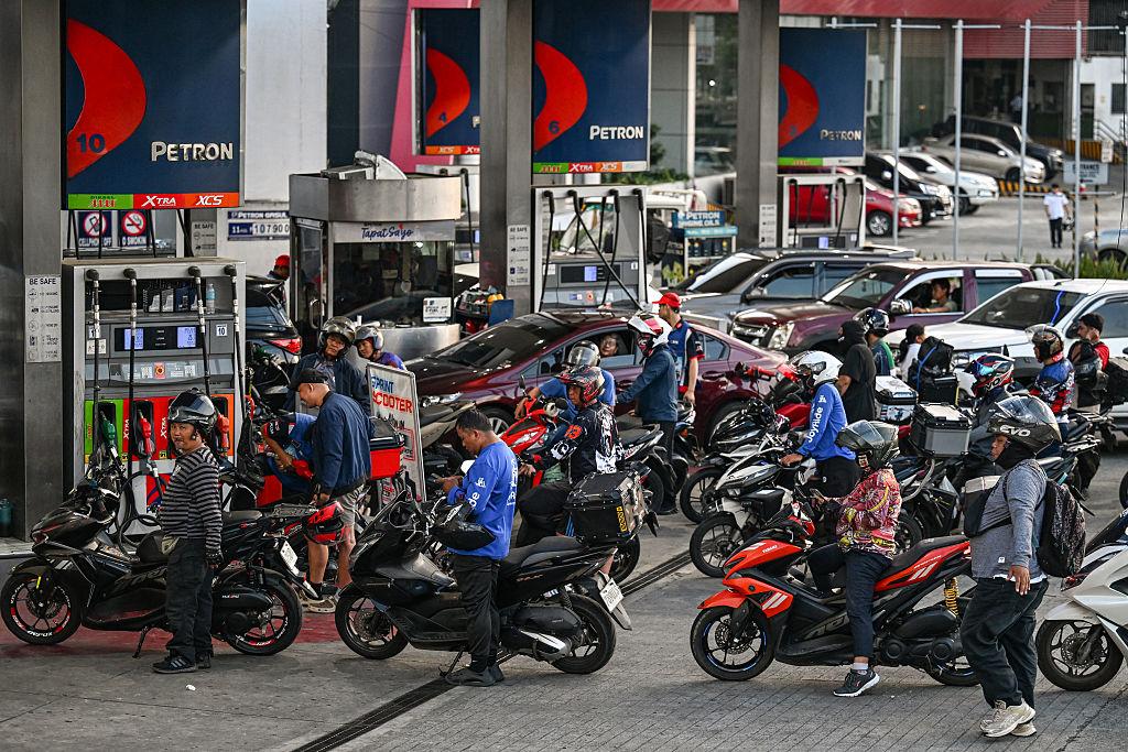 international energy diplomacy rising fuel prices Philippines petrol station crisis