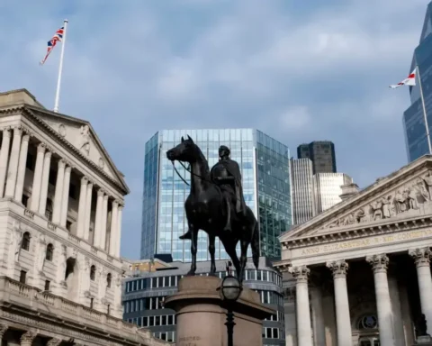 Bank of England cuts rates, warns of 4% inflation