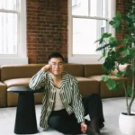 Bowen Yang signs off from SNL in teary final sketch with Ariana Grande and Cher