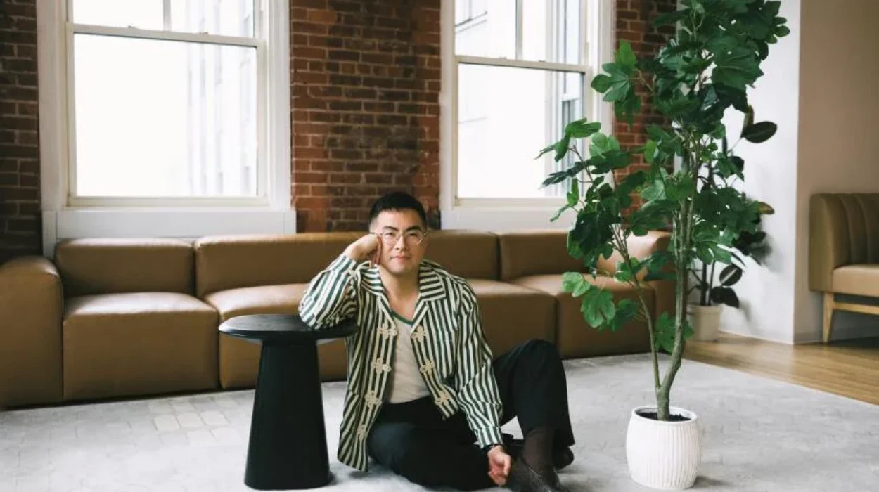 Bowen Yang signs off from SNL in teary final sketch with Ariana Grande and Cher