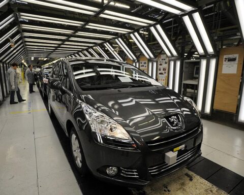 global car manufacturing shift concept with robotic automotive manufacturing technology
