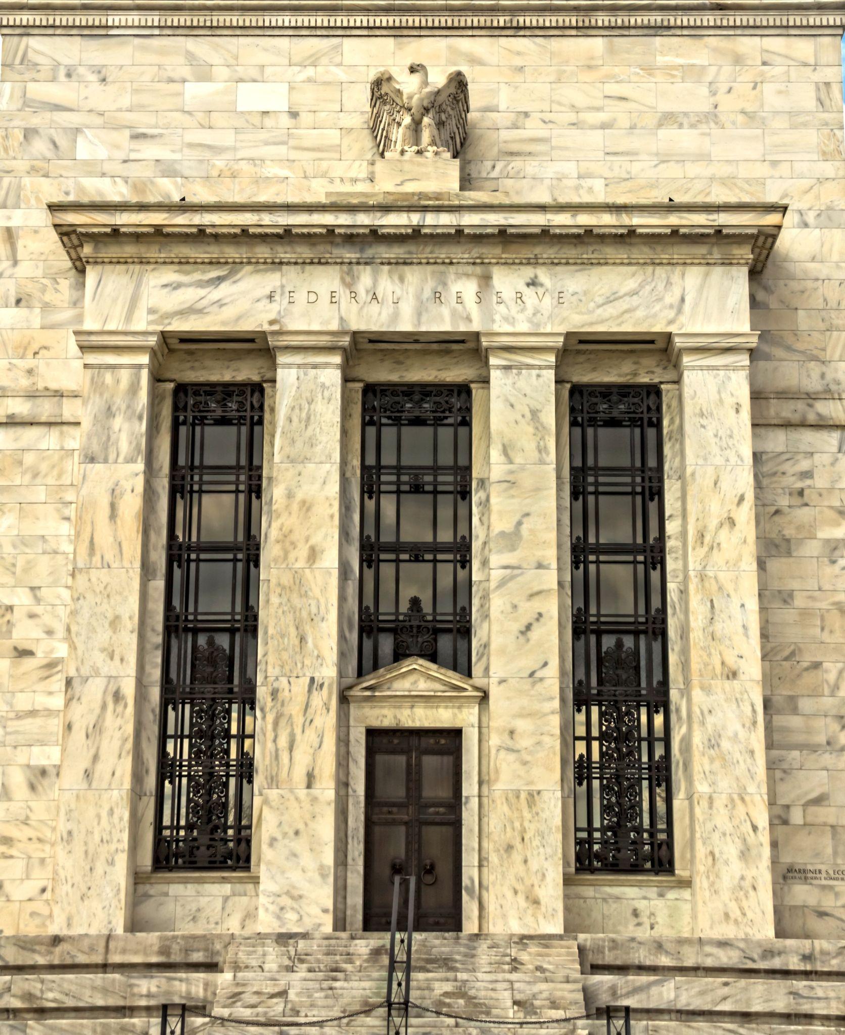 US markets today react to Federal Reserve policy signals