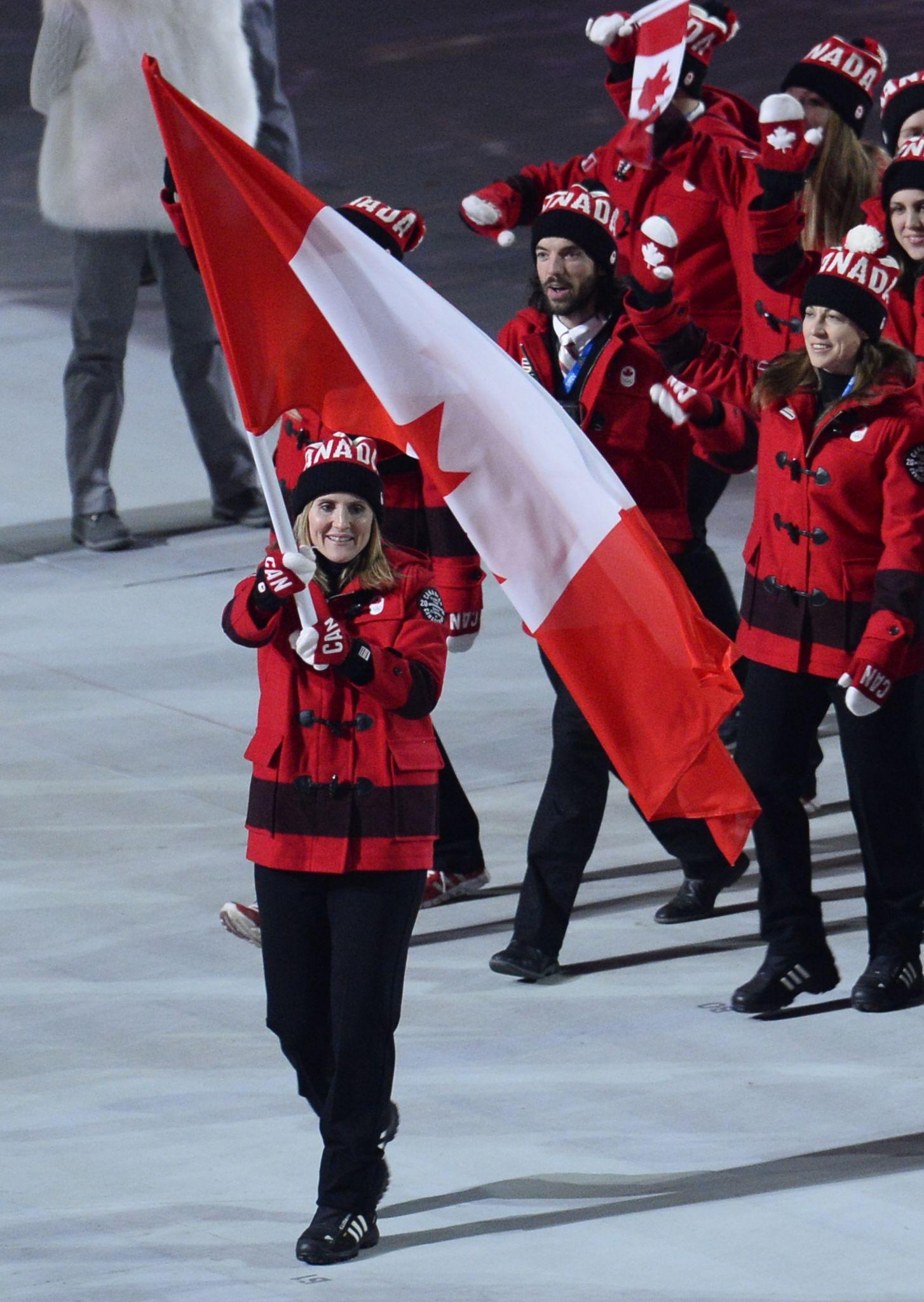 Olympic Medal Surge Drives Canada Momentum Italy 2026 1 Olympic medal surge during Canada gold medal ceremony at Italy 2026 Winter Games