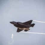 Middle East airspace conflict escalation Beirut skyline military aircraft 2026