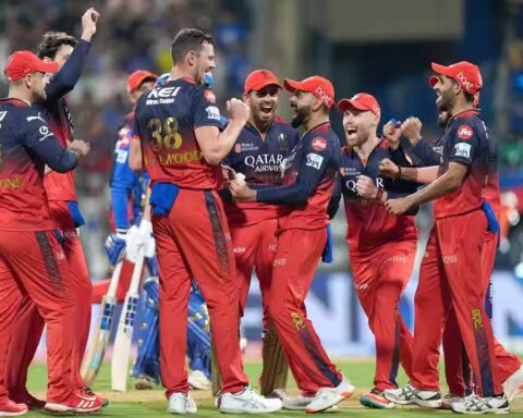 cricket match strategy Gujarat players celebrate wicket IPL