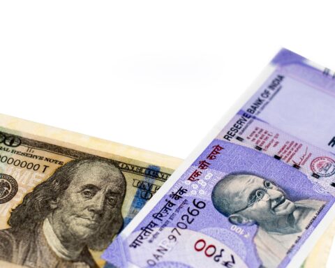 Currency traders monitoring global markets impact India in foreign exchange markets