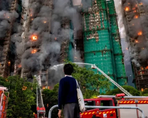 'Hang in there' Agonising wait for the missing after Hong Kong blaze