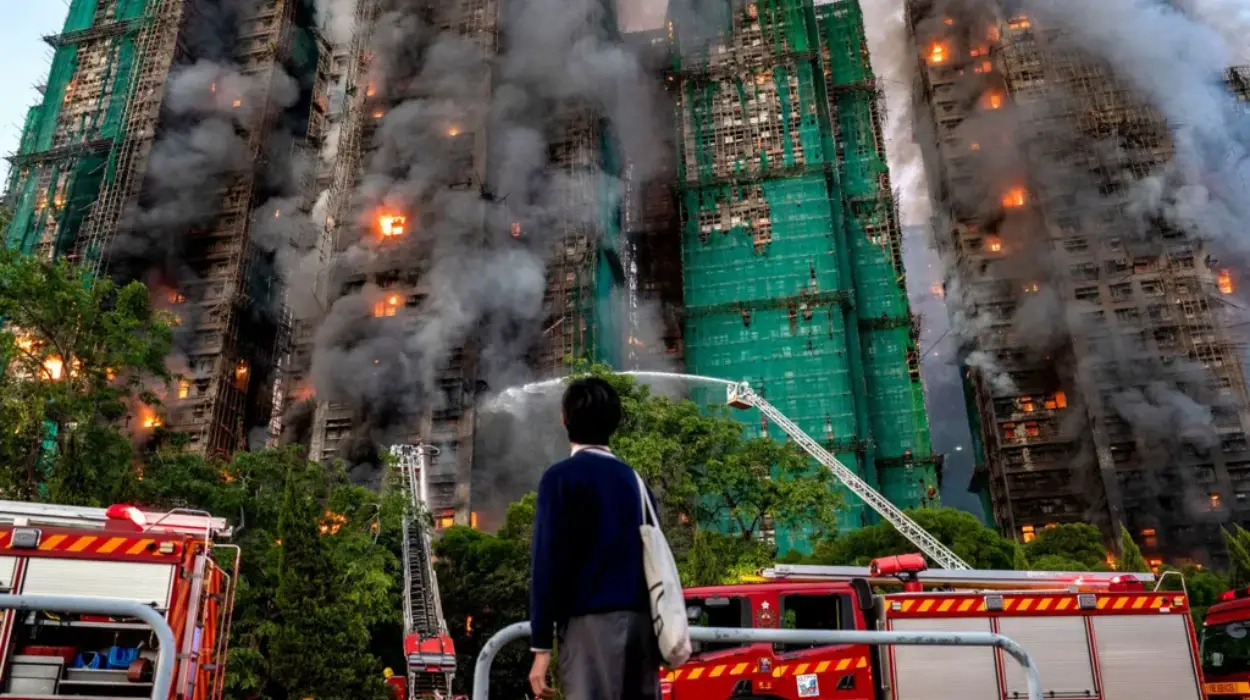 'Hang in there' Agonising wait for the missing after Hong Kong blaze