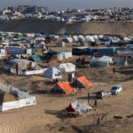 Gaza humanitarian emergency civilians receiving aid supplies 2026